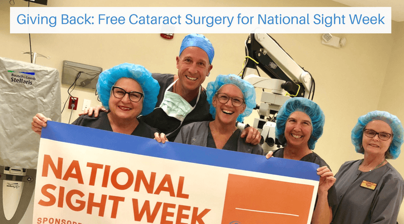 Dr. Elmer's team holding a banner for National Sight week in one of our surgery centers