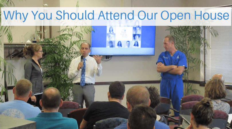 Doctors Endl and Elmer speaking before a crowd at a Fichte Endl & Elmer Eyecare open house event