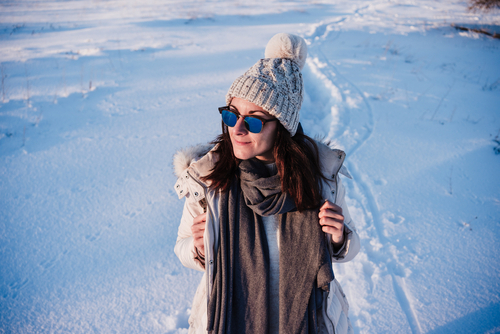 woman standing outside in snow